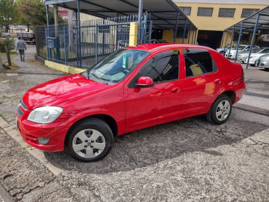 CHEVROLET - PRISMA - 2012/2012 - Vermelha - R$ 34.000,00